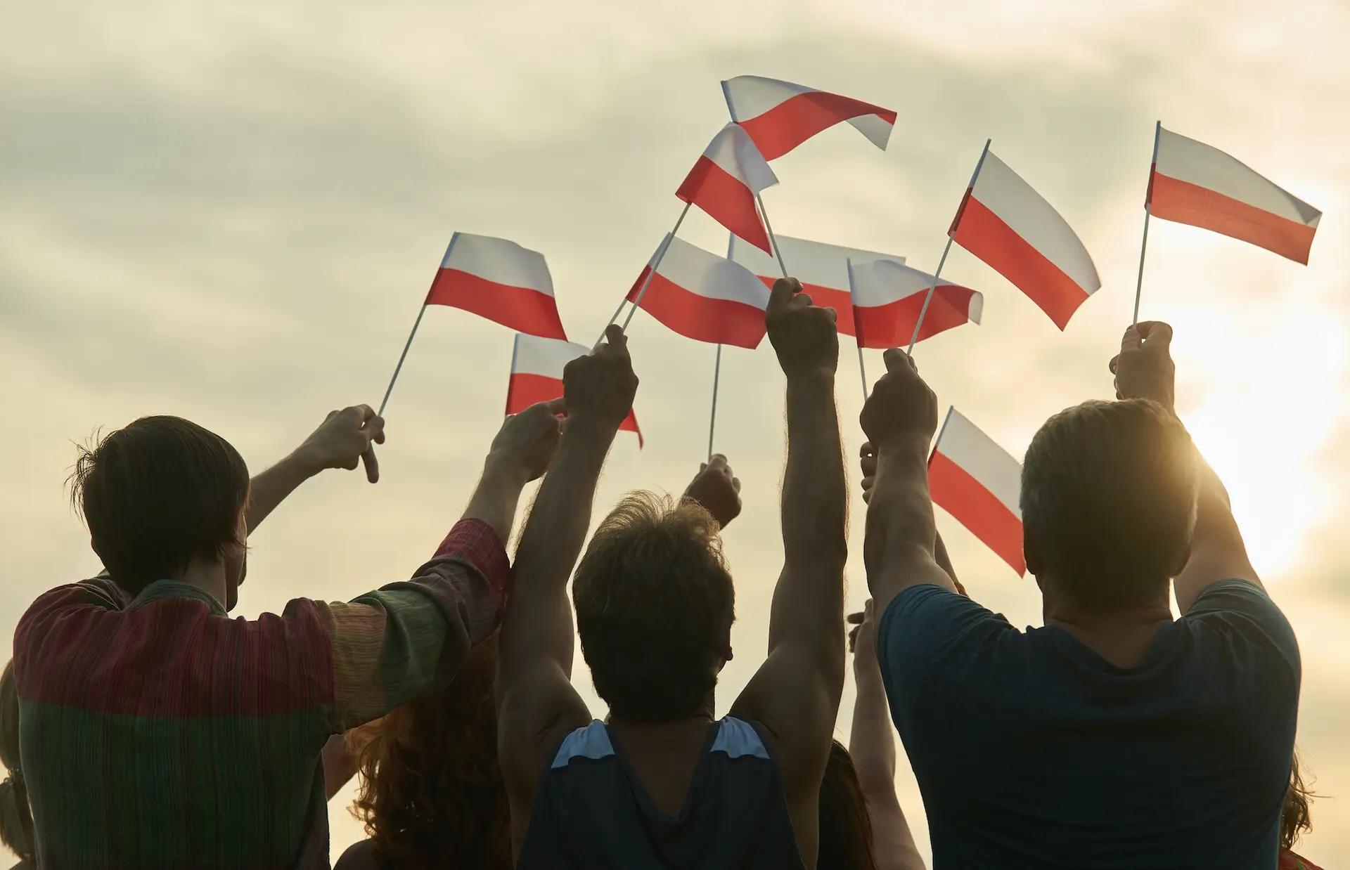 Waving poland flags.