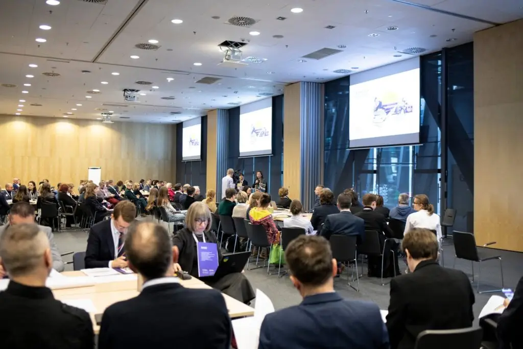Plenary session of the first Summit for Education in a large conference hall